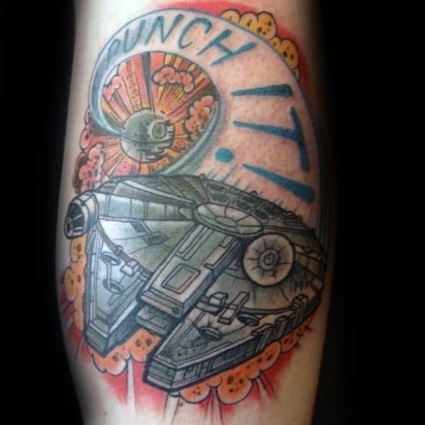 Millennium Falcon tattoo with vibrant orange and red tones, featuring the Death Star and the phrase “Punch It!!” in bold letters.