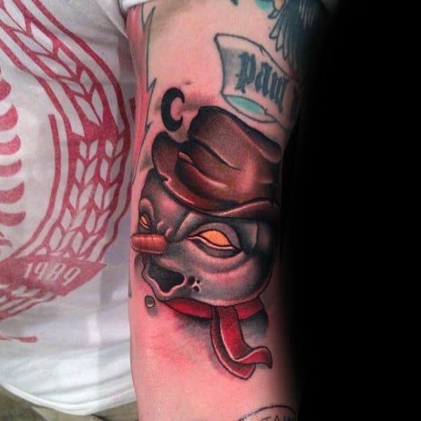 Dark-themed snowman tattoo with glowing eyes, a sinister expression, a top hat, and a scarf, blending horror and winter aesthetics.