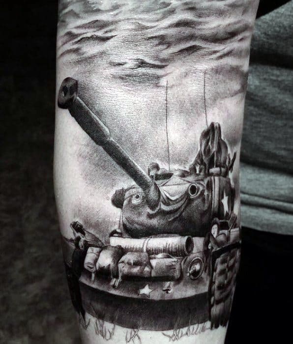 Hyper-realistic black and grey tattoo of a tank from a low angle, with cloudy skies and fine detail on gear and textures.