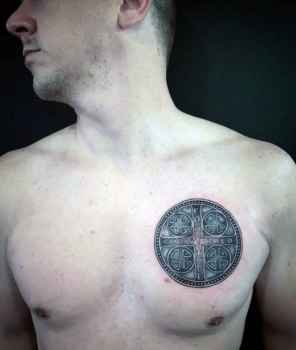 cross-circle-small-guys-chest-tattoo