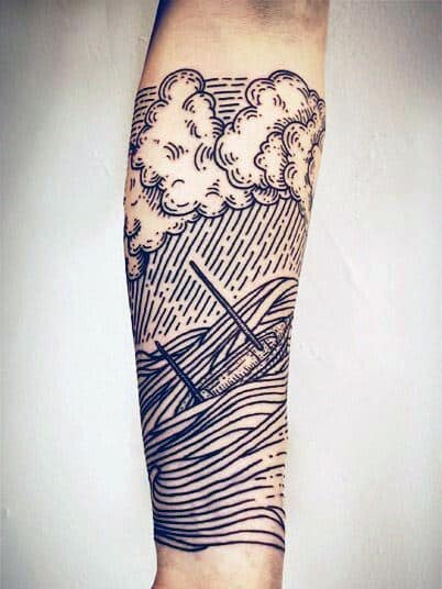 Forearm tattoo of a stormy sea with a sinking boat and clouds above