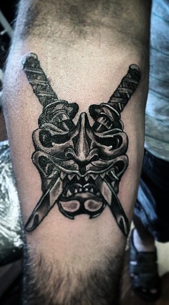 Crossing Skull Sword Tattoo On Mans Leg Calf