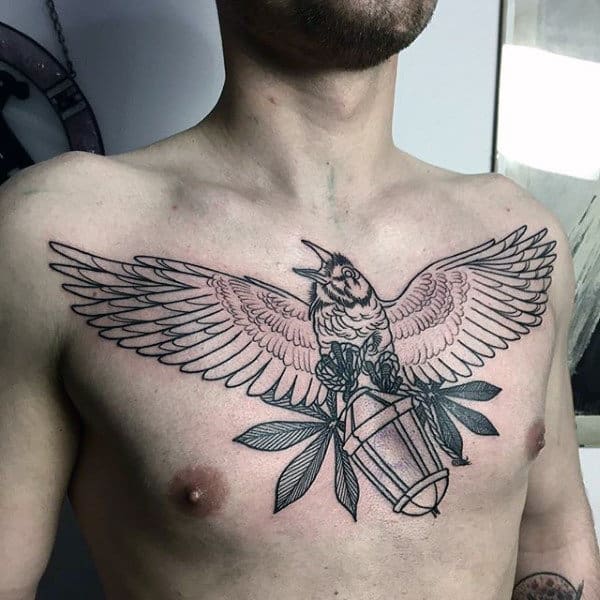 Crow Flying With Lantern Upper Chest Tattoos For Males