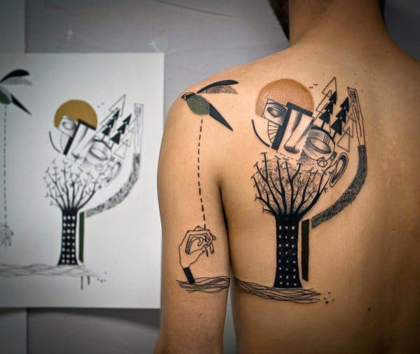 Cubist-style back tattoo featuring abstract faces, a black tree, birds, and geometric elements with earthy tones and artistic linework.