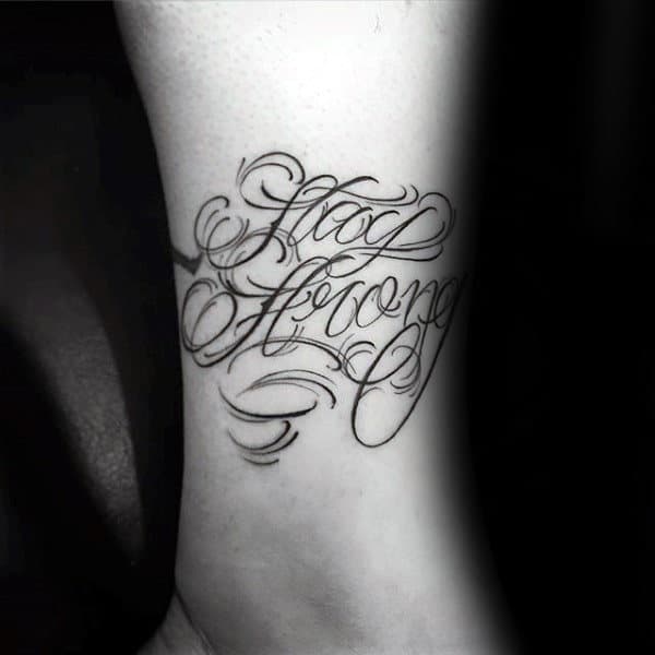 Cursive Ornate Male Strength Stay Strong Tattoo On Forearm