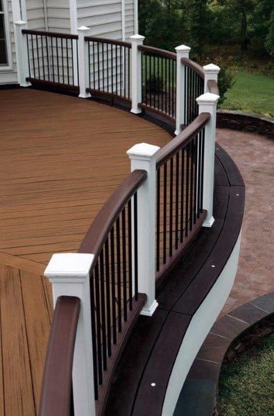 curved white and brown composite deck railing