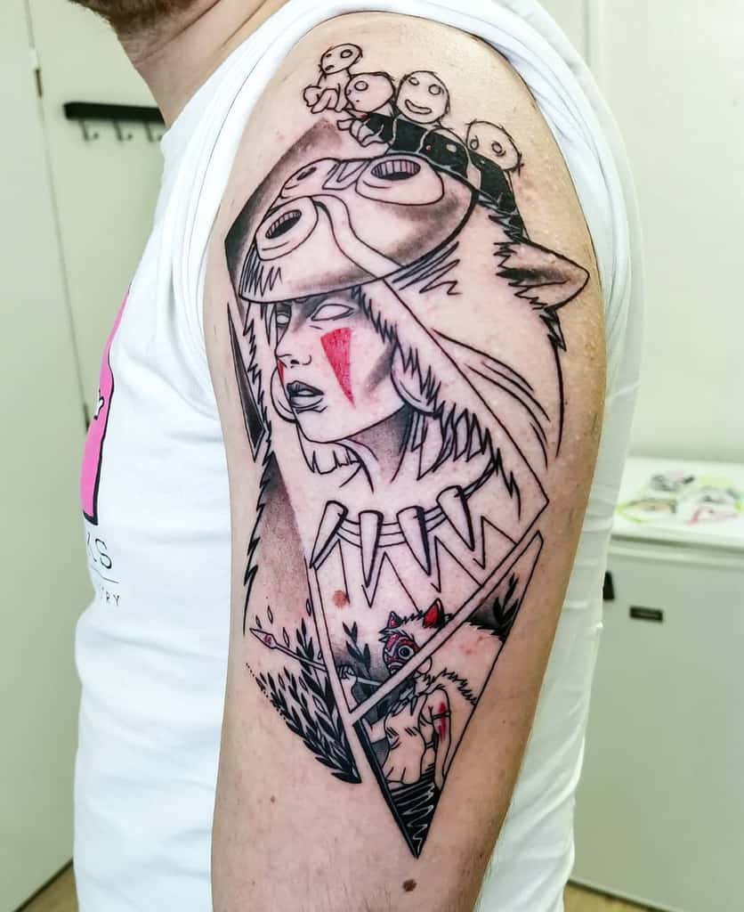 Detailed tattoo of a woman wearing a wolf headdress, with face markings and a strong, focused expression. The tattoo is split with geometric lines revealing her image and a subtle ghost-like figure at the bottom. Small ghost characters are shown atop her head, adding a playful and unique touch to the otherwise intense and intricate design.