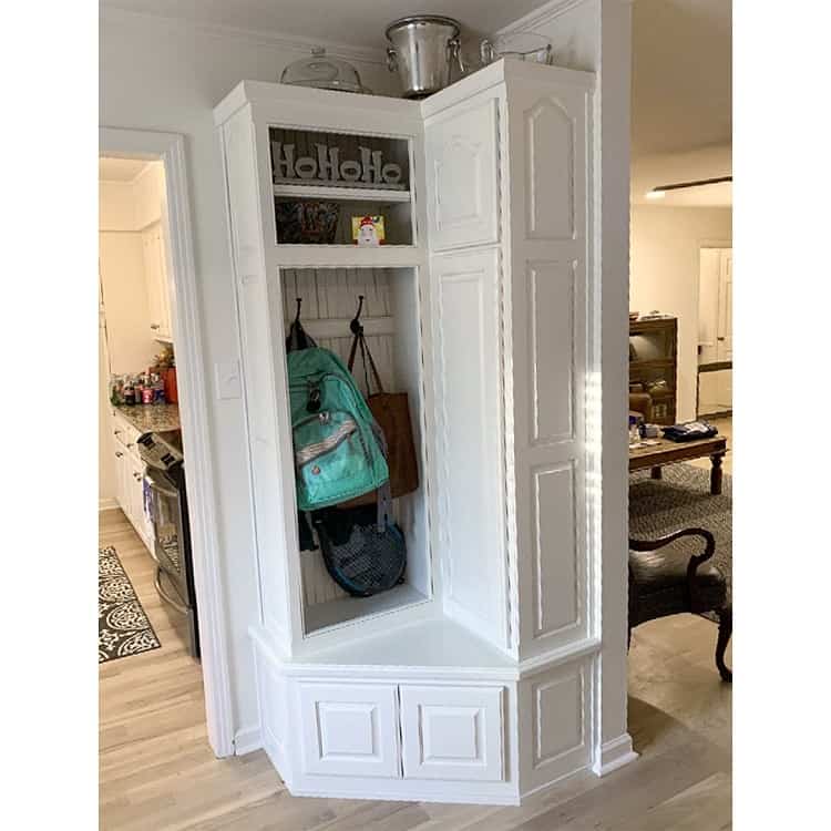 white custom mudroom corner cabinet 