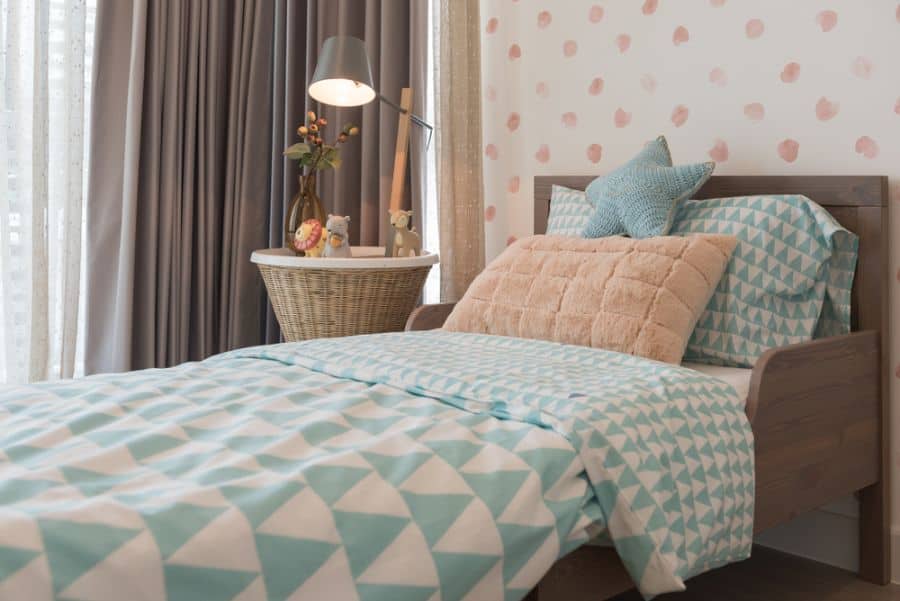 brown bed pink pattern wallpaper