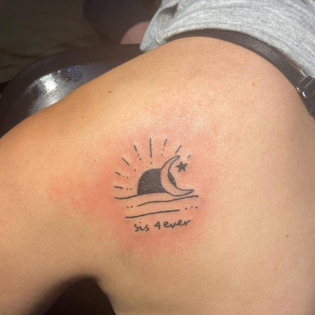 Minimalist sister tattoo featuring a sun setting behind waves, a crescent moon with a star, and the phrase 'sis 4 ever' in script