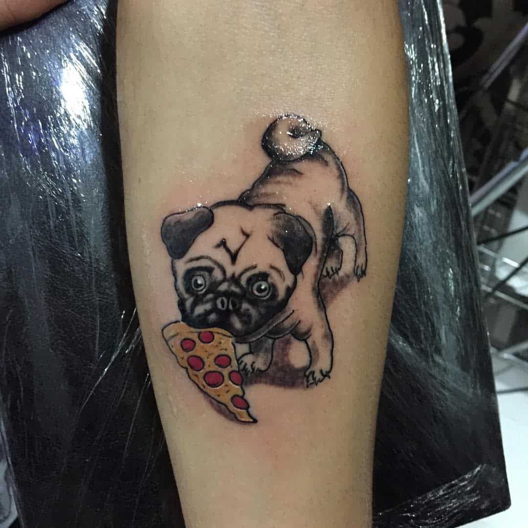 Tattoo of a pug holding a slice of pepperoni pizza