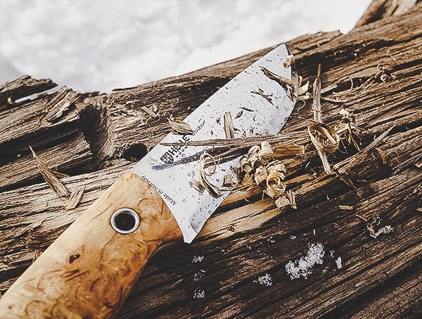 Cutting Into Wood Log With Helle Utvaer Knife