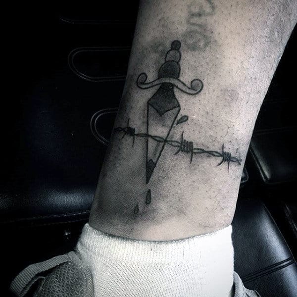Dagger Barbed Wire Guys Tattoo Design On Leg Above Ankle