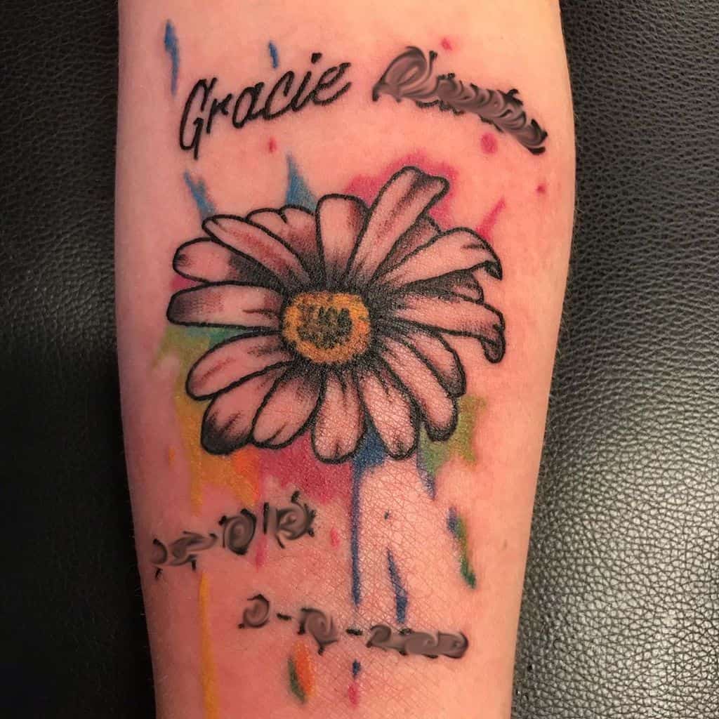 Forearm water color name and dates daisy tribute tattoo