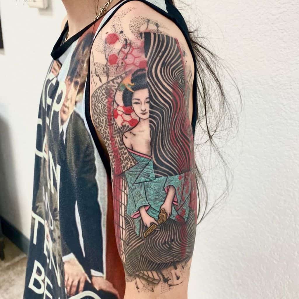 Intricate full-arm tattoo of a Geisha in a turquoise kimono, surrounded by bold patterns, waves, and red floral accents in a modern style.