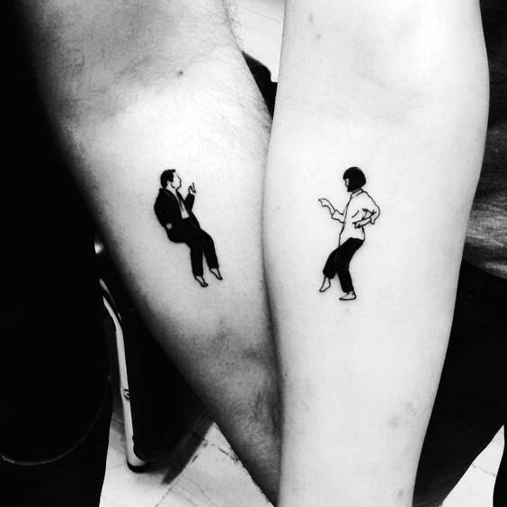 Matching forearm tattoos of Vincent and Mia dancing from *Pulp Fiction*, symbolizing shared style, fun, and a love for iconic moments.