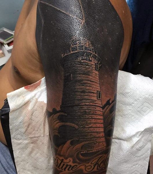 Dark Black Ink Mens Lighthouse Tattoo On Arm