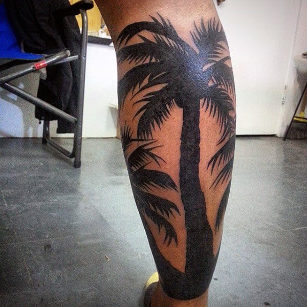 Dark Black Palm Tree Tattoo For Men On Lower Limb