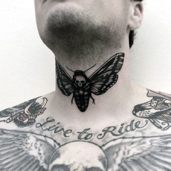 Throat tattoo of a death's-head hawk moth with intricate black and gray shading, featuring a skull design on its back for a bold look