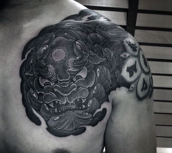 Dark Foo Dog Mens Upper Chest Tattoo Design Ideas