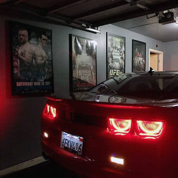 Dark Grey Garage Paint Colors With Poster Decor On Wall
