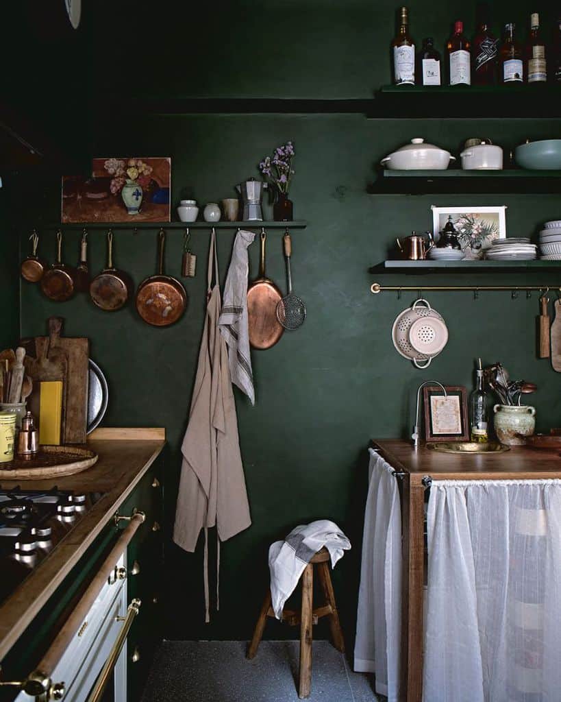 dark green accent wall rustic kitchen