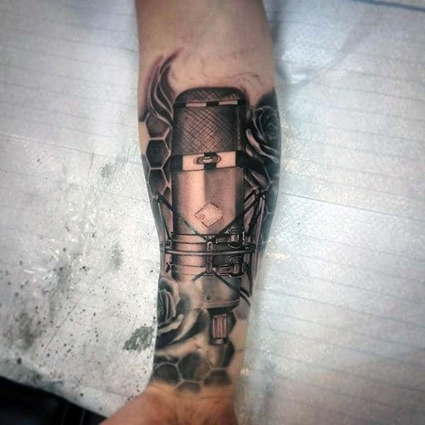 Dark Metallic Musical Tattoo For Men On Wrist