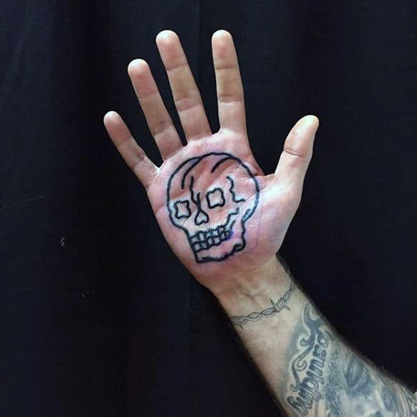 Dark Outline Of Skull Tattoo Male Palms