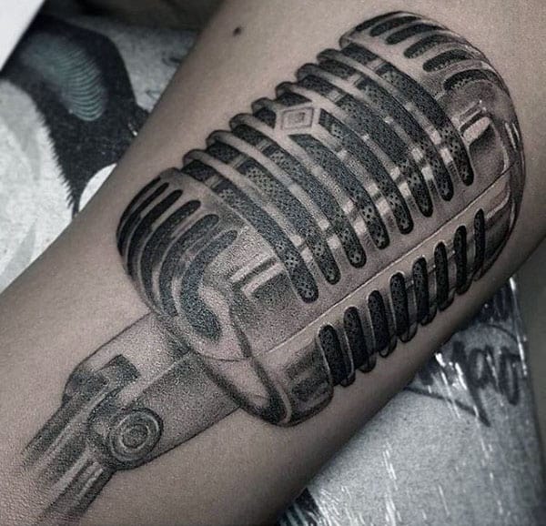 Dark Shaded Pencil Art Tattoo Of Microphone Guys Forearms
