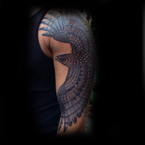 Dark Stylish Hawk Upper Arm Tattoo On Man