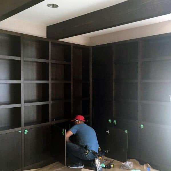 Floor-to-ceiling black shelves