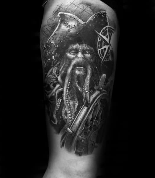 Davy Jones tattoo of a pirate with tentacles and a ship's wheel