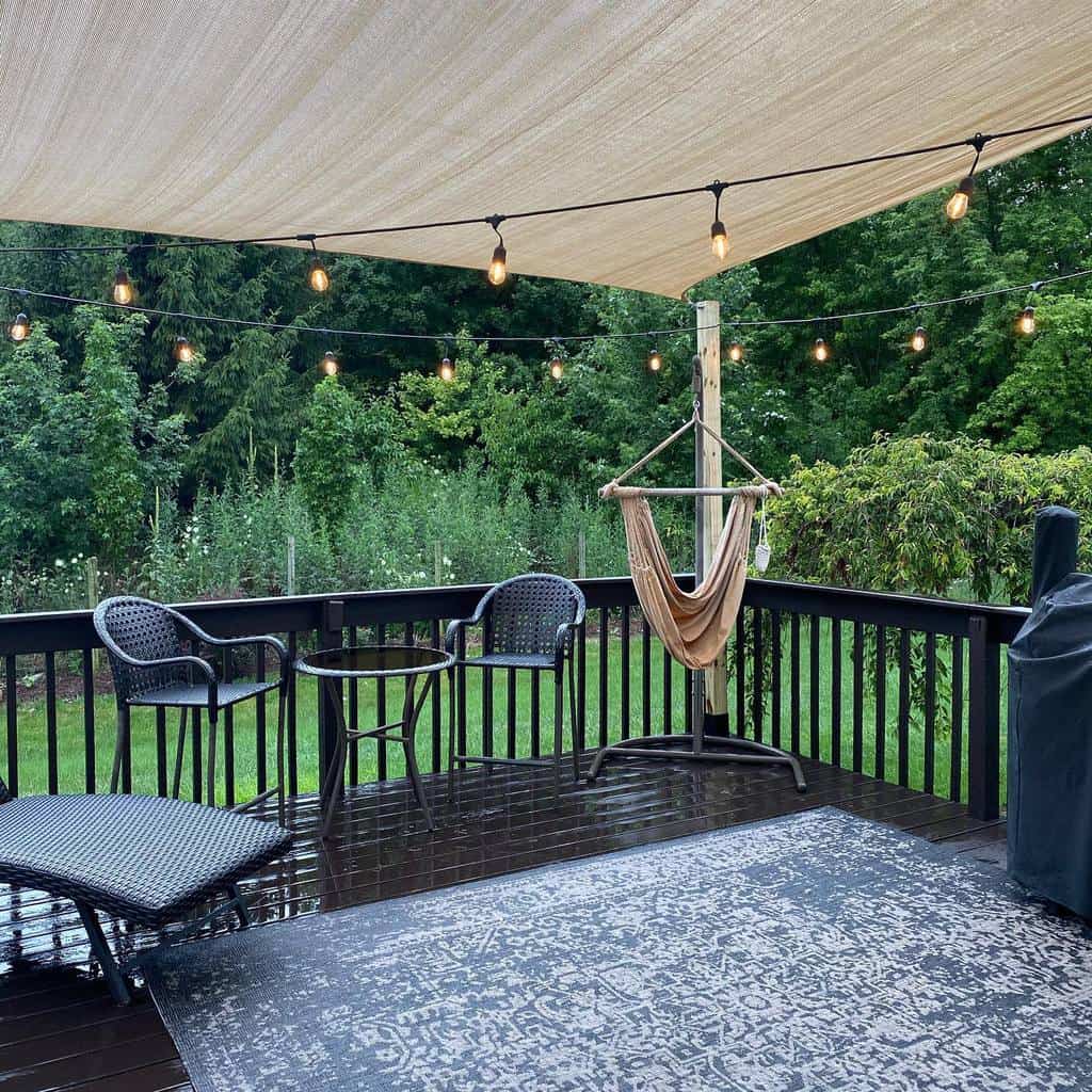 deck patio with shade cover and string lights