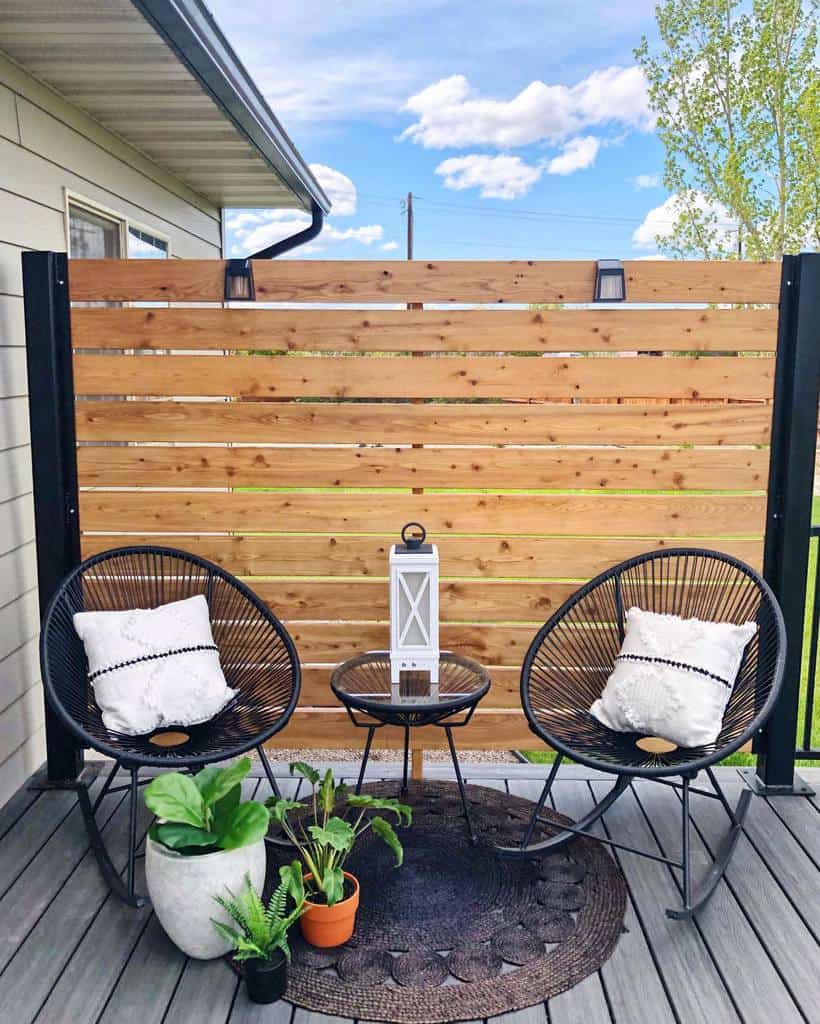 small deck patio with wood privacy fence 