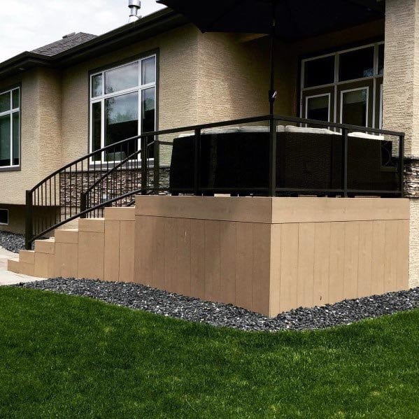 black railing wood skirting cool backyard ideas