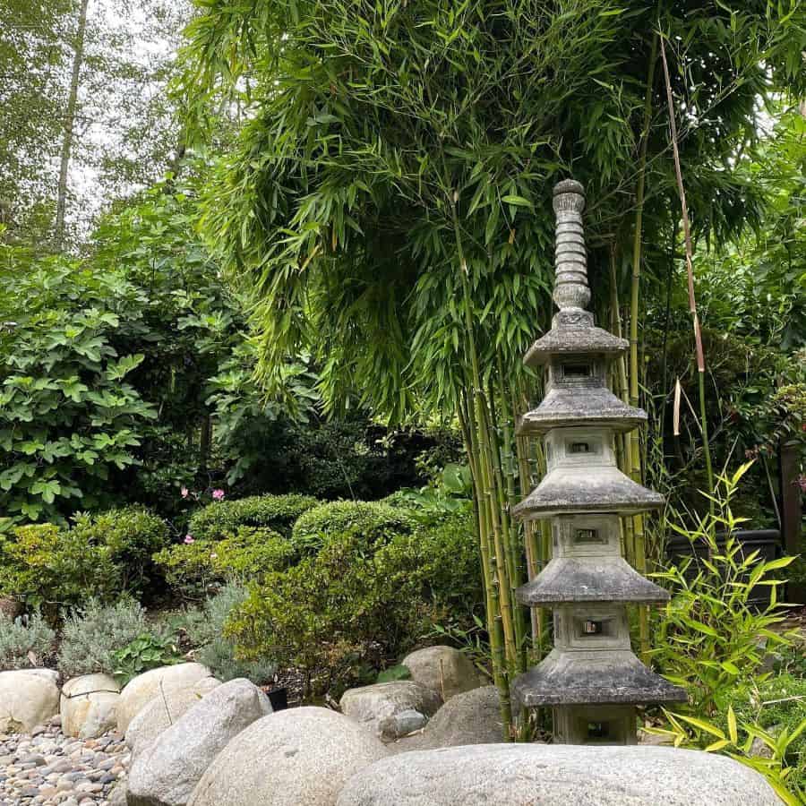 religious stone sculpture in zen garden 