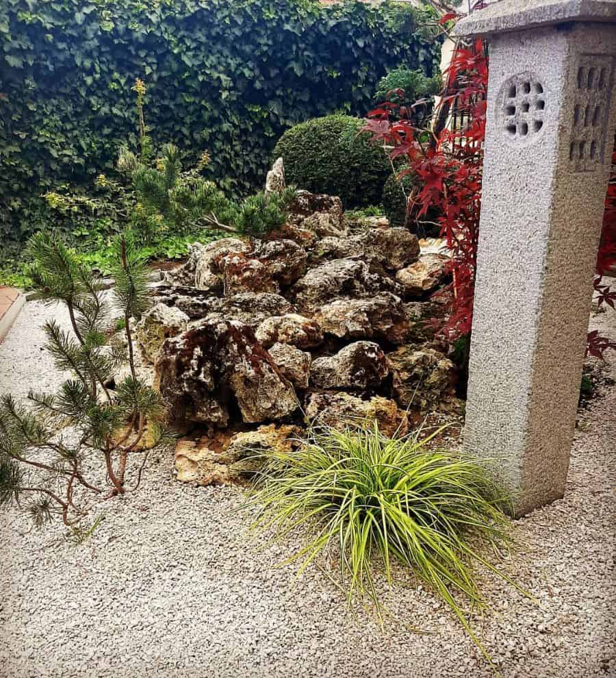 japanese garden with stone statue