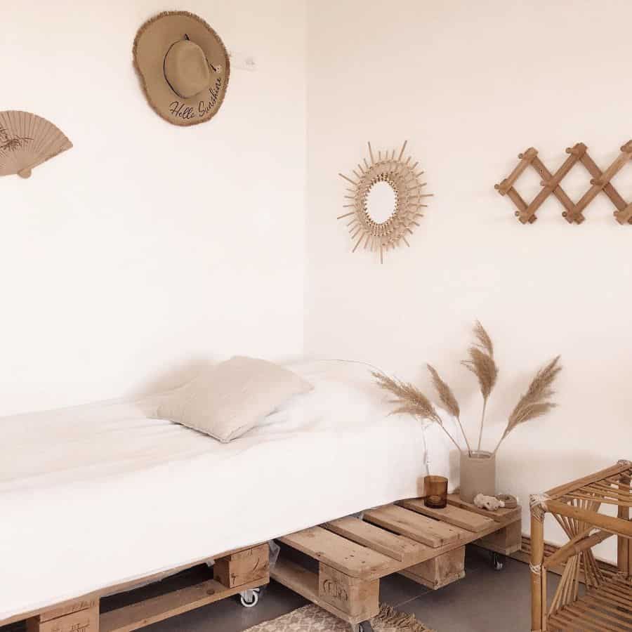 boho style bedroom with bed made from pallets