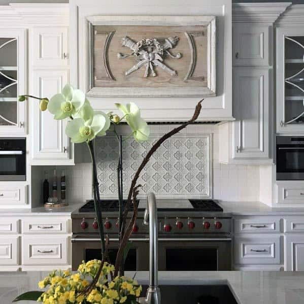 decorative carving ornate kitchen hood