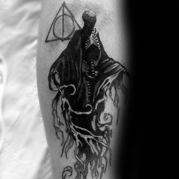Detailed Dementor tattoo with skeletal chest and tattered cloak, paired with the Deathly Hallows symbol above.