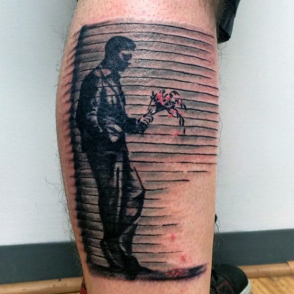 Depressed Man Holding Flowers Mens Banksy Leg Tattoos