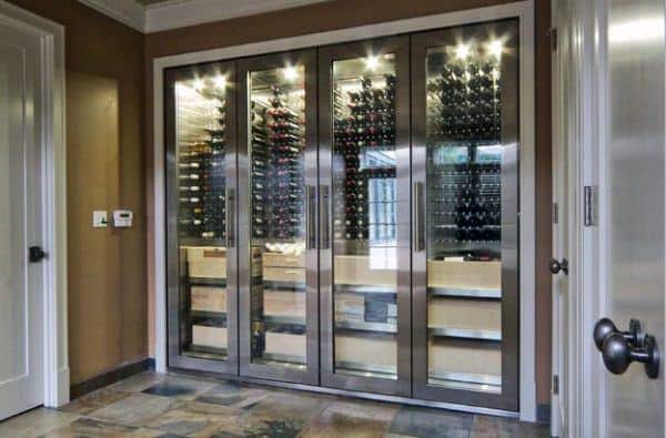 Modern home with a glass-enclosed wine cellar, where shelves are elegantly stocked with fine wine bottles