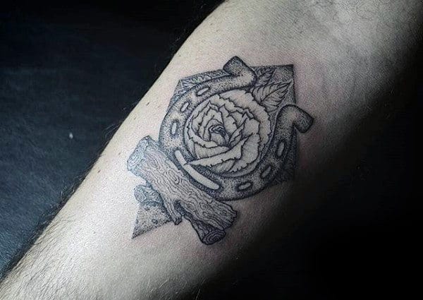 Detailed Dotwork Horseshoe Tattoo On Guys Inner Forearm
