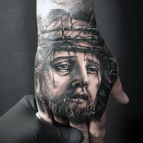 Detailed Guys Jesus Portrait Tattoo Ideas On Hands