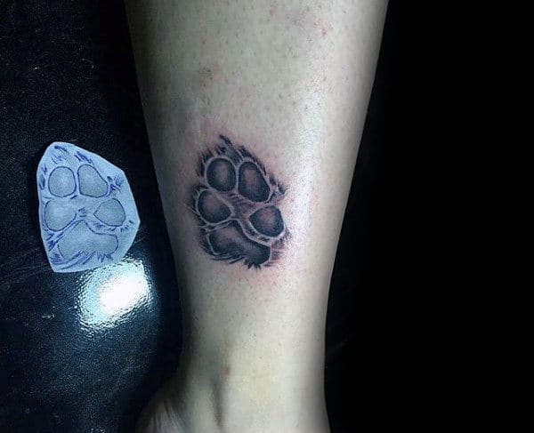 Detailed Male Fuzzy Dog Paw Print Tattoo On Lower Leg