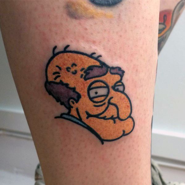 Tattoo of Herbert from Family Guy with a sly expression, wrinkled face, and balding head, capturing his signature creepy look.