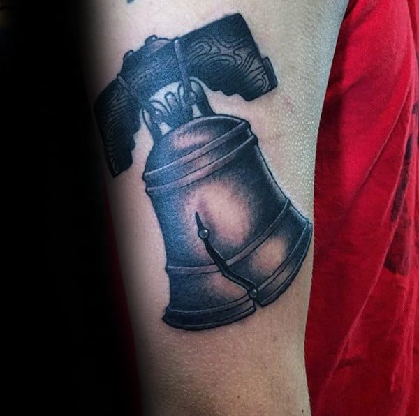 Detailed Shaded Liberty Bell Guys Upper Arm Tattoos