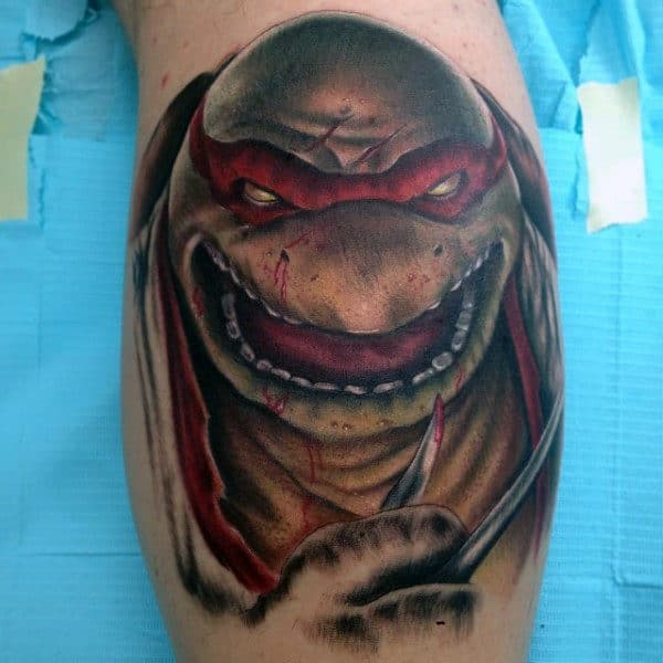 Detailed Teenage Mutant Ninja Turtle Raphael Tattoo Designs For Men On Leg Calf