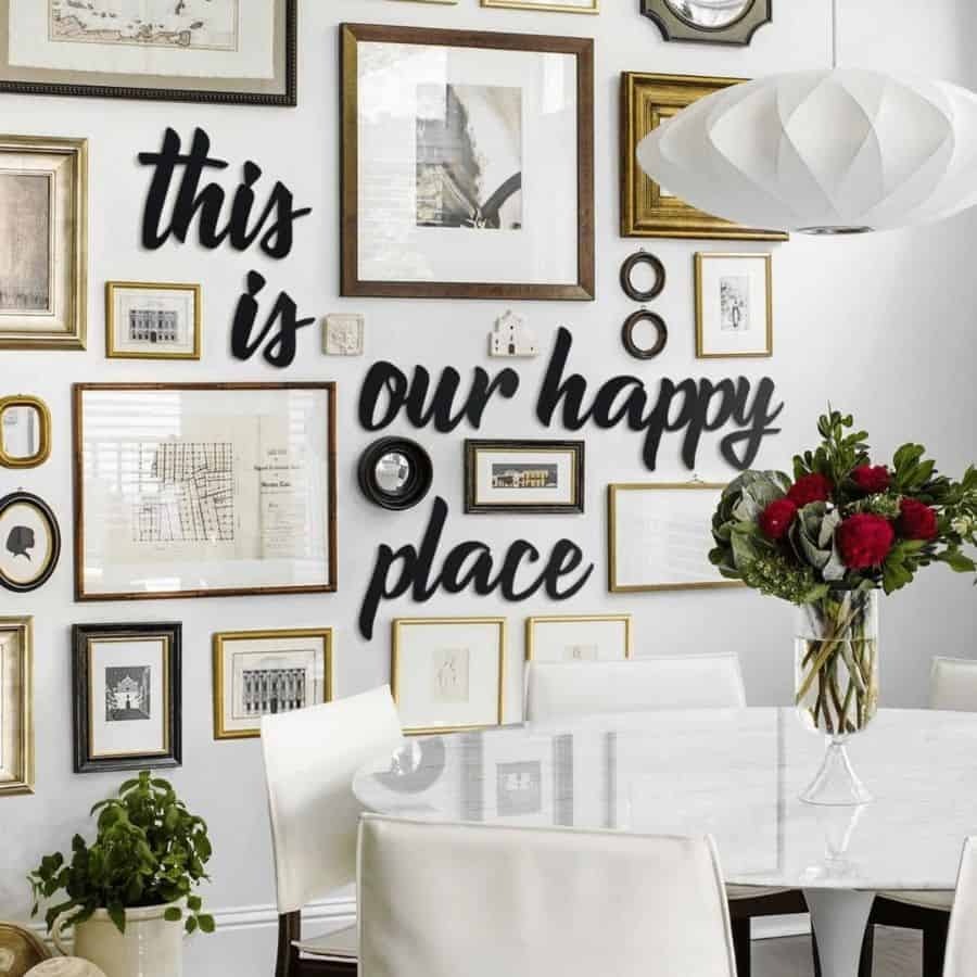 gold framed artwork in dining room