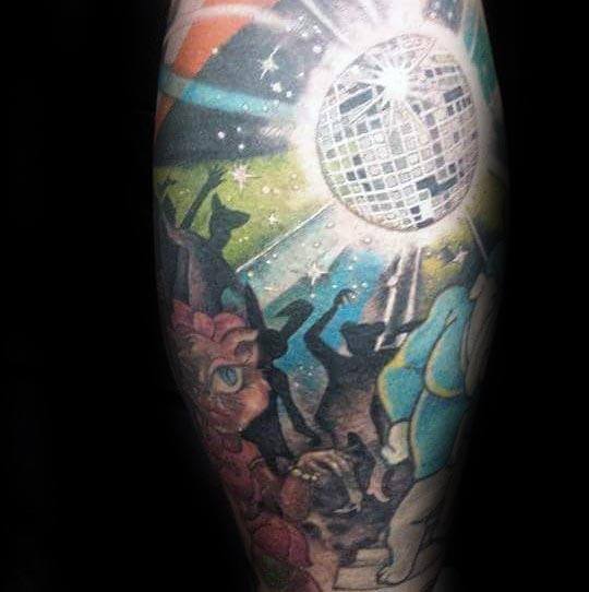 Vibrant tattoo of a disco ball casting colorful lights over dancing silhouettes, creating a lively party scene with bold shading and detail.